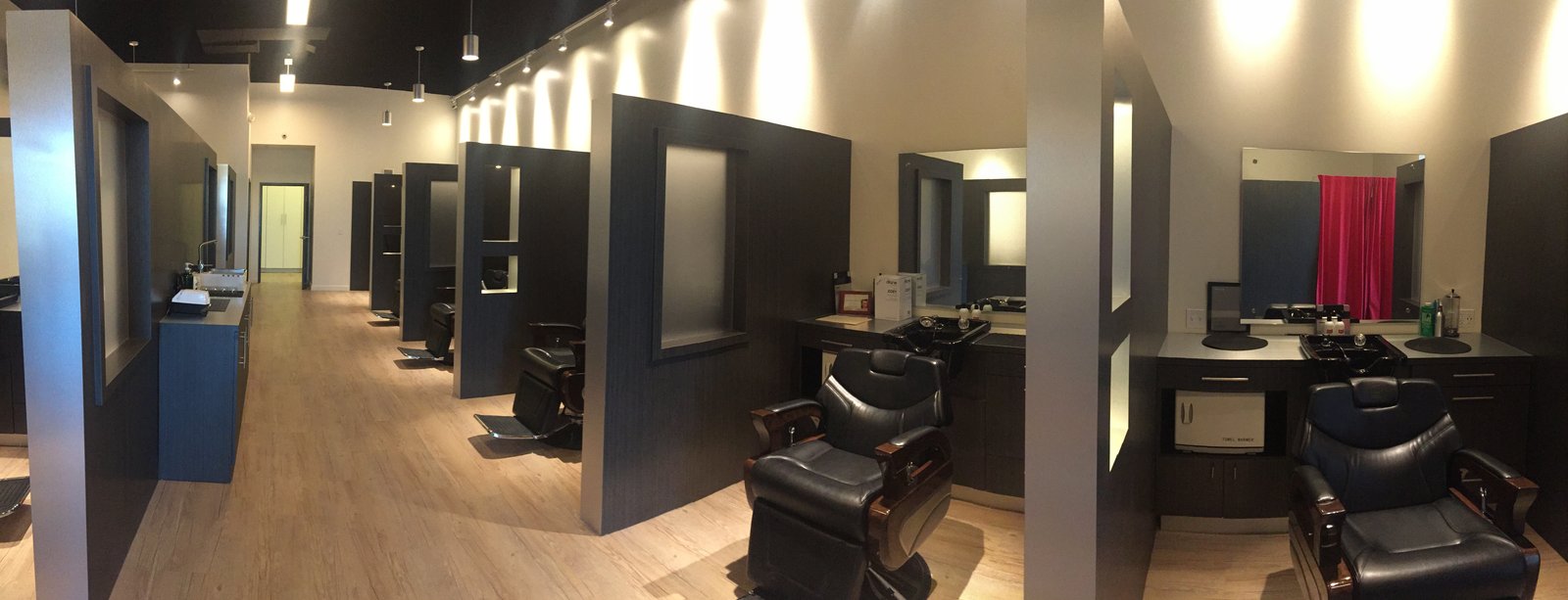 Panoramic view of 18|8 Fine Men's Salons Preston Hollow Village interior with multiple styling stations